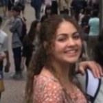 NAU student posing in a busy crowd in Japan.