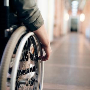 A man on a wheelchair.