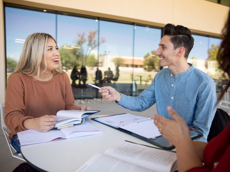 Two students talking outside.
