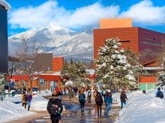 nau ses students walk to class in winter